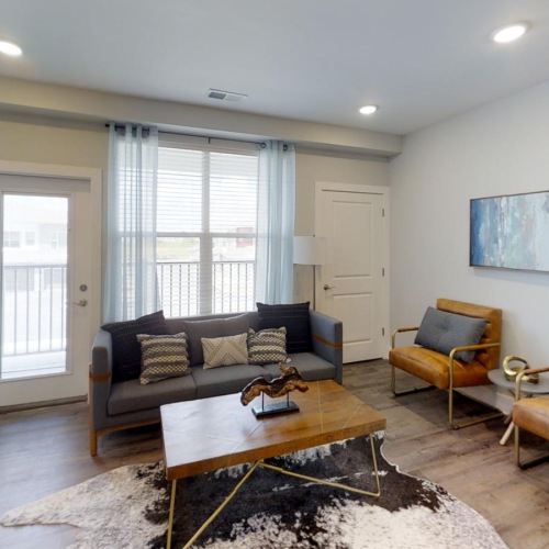 a living room with a couch and a coffee table
